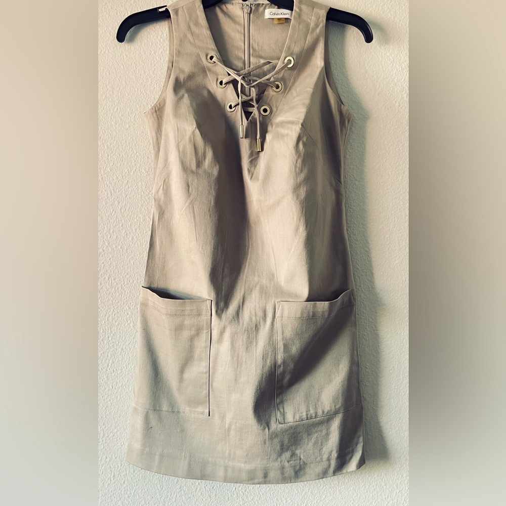 Calvin Klein tan dress 👗 is cute 🥰